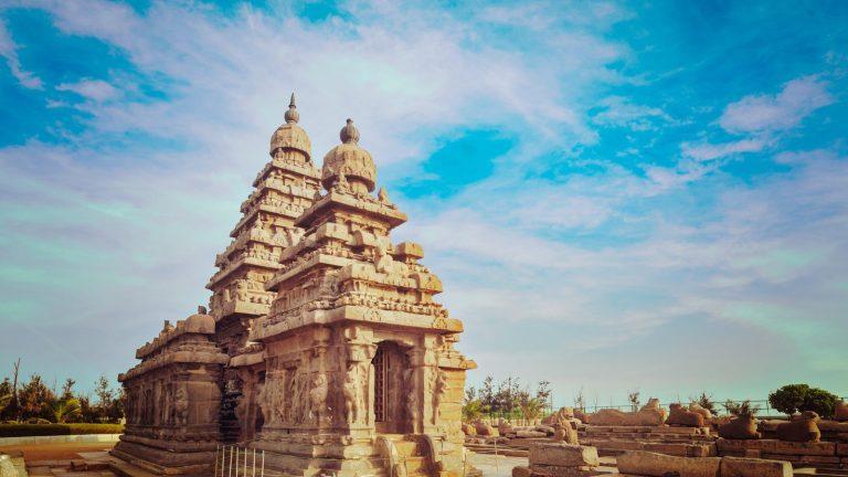 Beach temple in Mahabalipuram against a blue sky, India